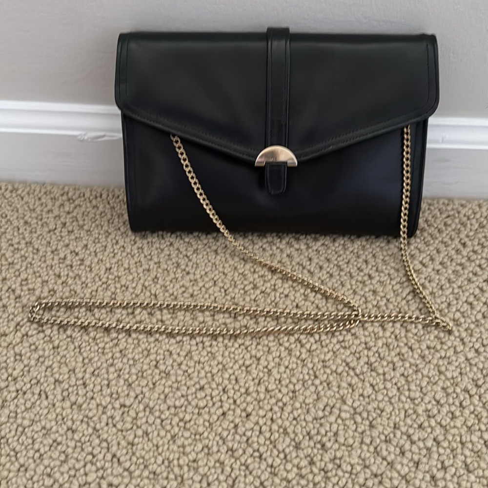 Saks Fifth Ave Vintage Black Leather clutch with shoulder chain.